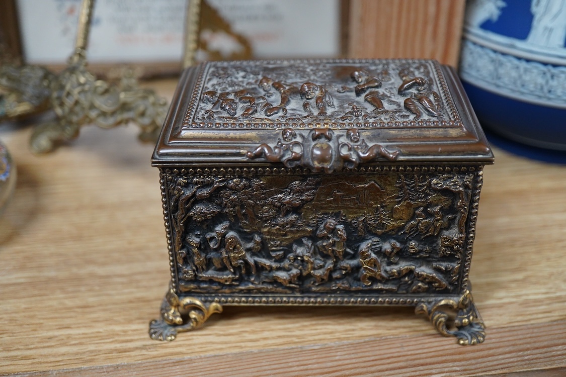 A group of brass and other metalware including an easel, various boxes, mirror etc.(9).